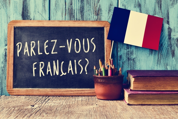French words written on a chalkboard 