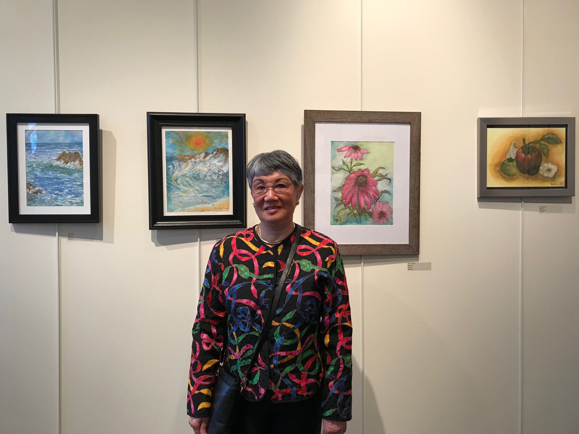 Make Your Art More of a Business photo of Midori Liu and paintings - Continuing Education at Seattle Central College 