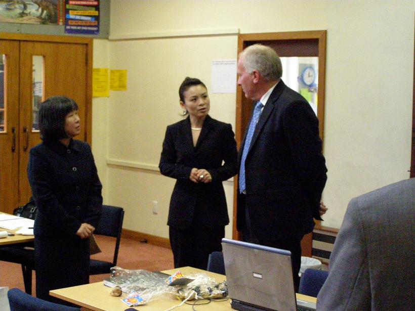 Saori Sampa on left working as interpreter 